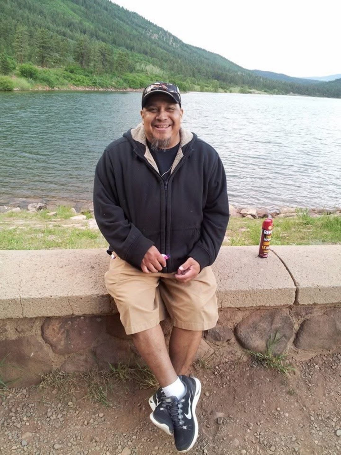 David Armando Resendes smiling by the lake