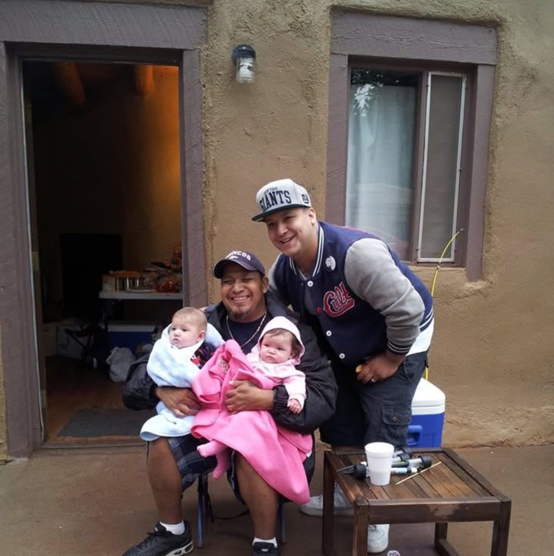 Holding two little ones